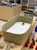 Wahakura baby bassinet woven in Ōtautahi, Aotearoa