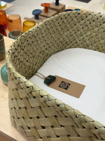 Wahakura baby bassinet woven in Ōtautahi, Aotearoa