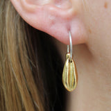 Earrings made by Sarah Smuts-Kennedy of Tāmaki Makaurau, Aotearoa