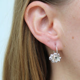 Earrings made by Sarah Smuts-Kennedy of Tāmaki Makaurau, Aotearoa