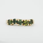 Green sapphire five stone ring by Zoe McBride of Auckland, New Zealand