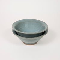 Lipped bowl by Driving Creek Pottery made in the Coromandel, Aotearoa, two colours