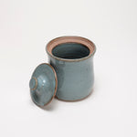 Small lidded jar by Driving Creek Pottery made in the Coromandel, Aotearoa, two colours