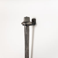 Bracket for fire poker made in Darfield, Aotearoa