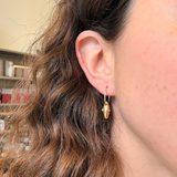 Earrings made by Sarah Smuts-Kennedy of Tāmaki Makaurau, Aotearoa