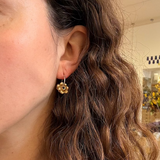 Earrings made by Sarah Smuts-Kennedy of Tāmaki Makaurau, Aotearoa