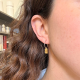Earrings made by Sarah Smuts-Kennedy of Tāmaki Makaurau, Aotearoa