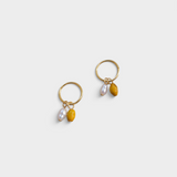 Kōwhai pearl sleepers in gold by Avara Studio made in Tāmaki Makaurau, Aotearoa
