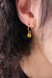 Kōwhai pearl sleepers in gold by Avara Studio made in Tāmaki Makaurau, Aotearoa