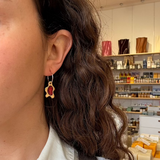 Earrings made by Sarah Smuts-Kennedy of Tāmaki Makaurau, Aotearoa