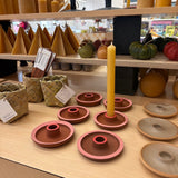 Pink and red candle holder made by Potterbee in Nelson, Aotearoa