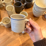 Blue line coffee cup made by Zoë Isaacs of Wellington, New Zealand