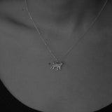 Little dog necklace by Camille Paloma Walton made on the Kāpiti Coast, Aotearoa