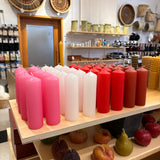 Coloured pillar candle made by National Candles in Wellington, Aotearoa
