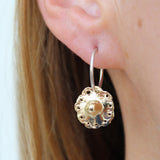 Earrings made by Sarah Smuts-Kennedy of Tāmaki Makaurau, Aotearoa