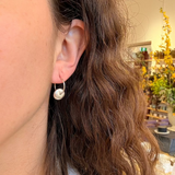 Earrings made by Sarah Smuts-Kennedy of Tāmaki Makaurau, Aotearoa
