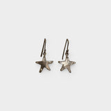 Starfish earrings by Camille Paloma Walton made on the Kāpiti Coast, Aotearoa