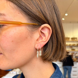 Earrings made by Sarah Smuts-Kennedy of Tāmaki Makaurau, Aotearoa