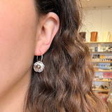 Earrings made by Sarah Smuts-Kennedy of Tāmaki Makaurau, Aotearoa