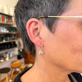 Earrings made by Sarah Smuts-Kennedy of Tāmaki Makaurau, Aotearoa