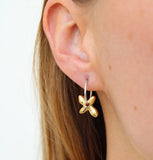 Earrings made by Sarah Smuts-Kennedy of Tāmaki Makaurau, Aotearoa