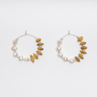 Kōwhai pearl hoops by Avara Studio made in Tāmaki Makaurau, Aotearoa