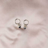 Protea charm earrings made by Meadowlark in Tāmaki Makaurau Auckland