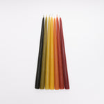 Beeswax taper candle by Studio Star made in Amberley, Aotearoa, seven colours