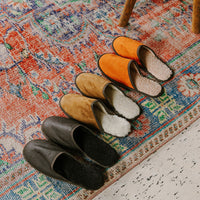 Row of three pairs of slippers