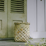 Large flax waikawa basket on a deck. 