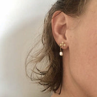 Club stud earrings in black silver, silver or gold by Hannah Upritchard